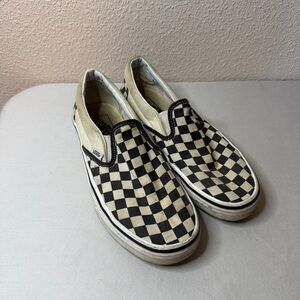 Vans Women's Black and Cream Checkerboard Slip-On Sneakers